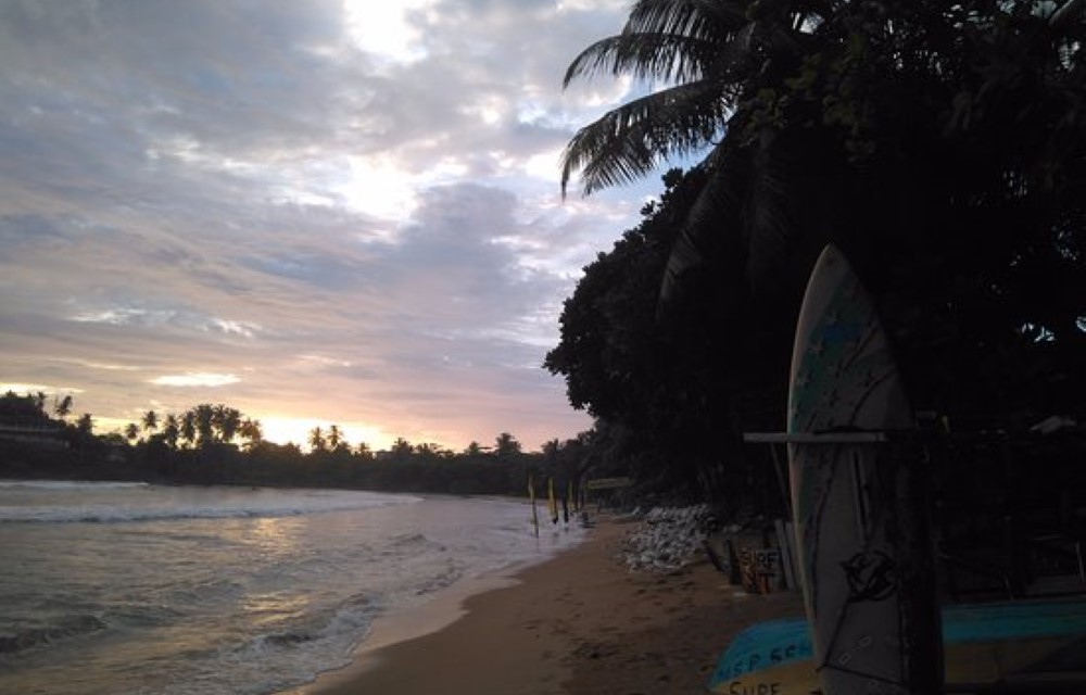 Surfing at Dewata Beach
